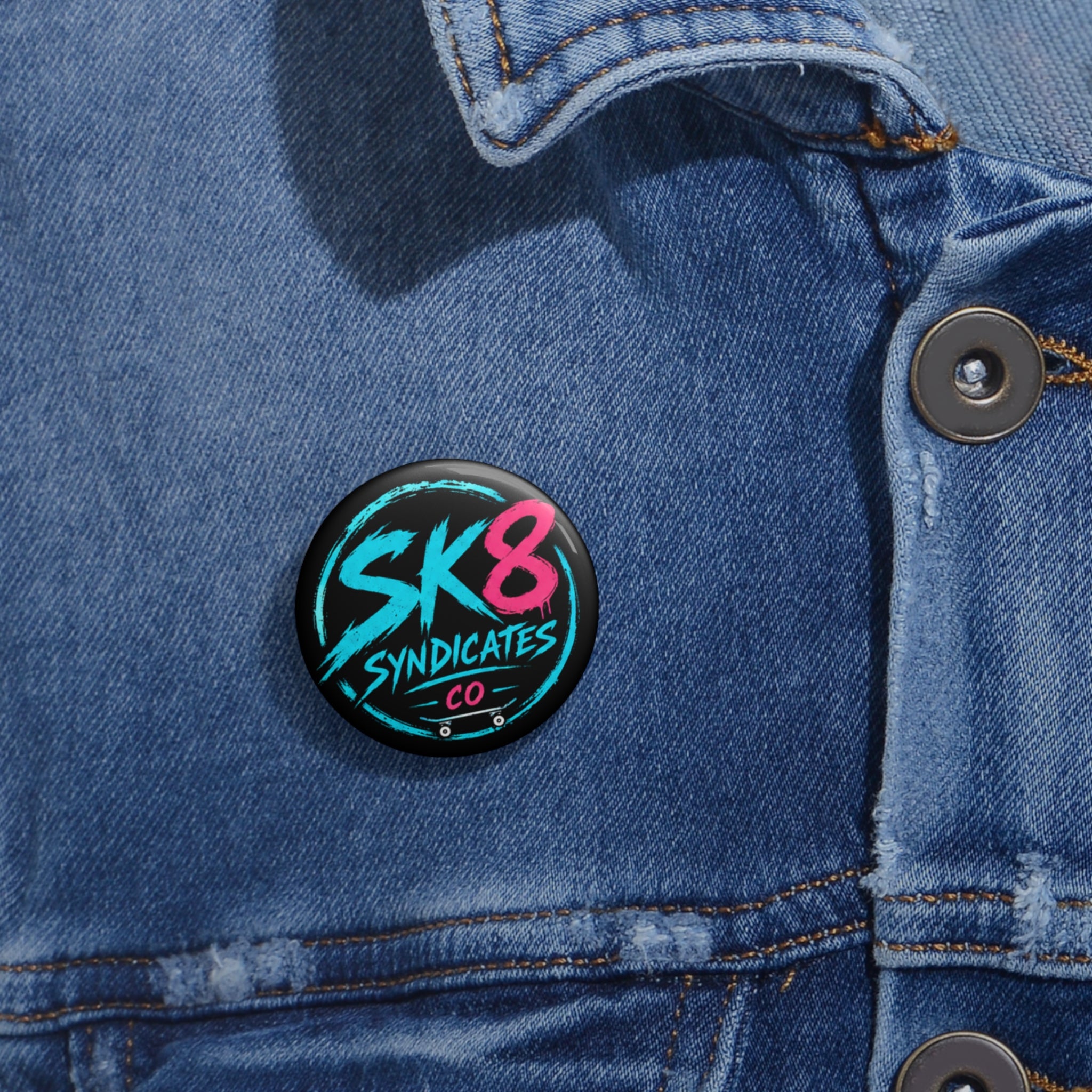 Clean baby blue, pink & black SK8 Syndicates Co. pin button